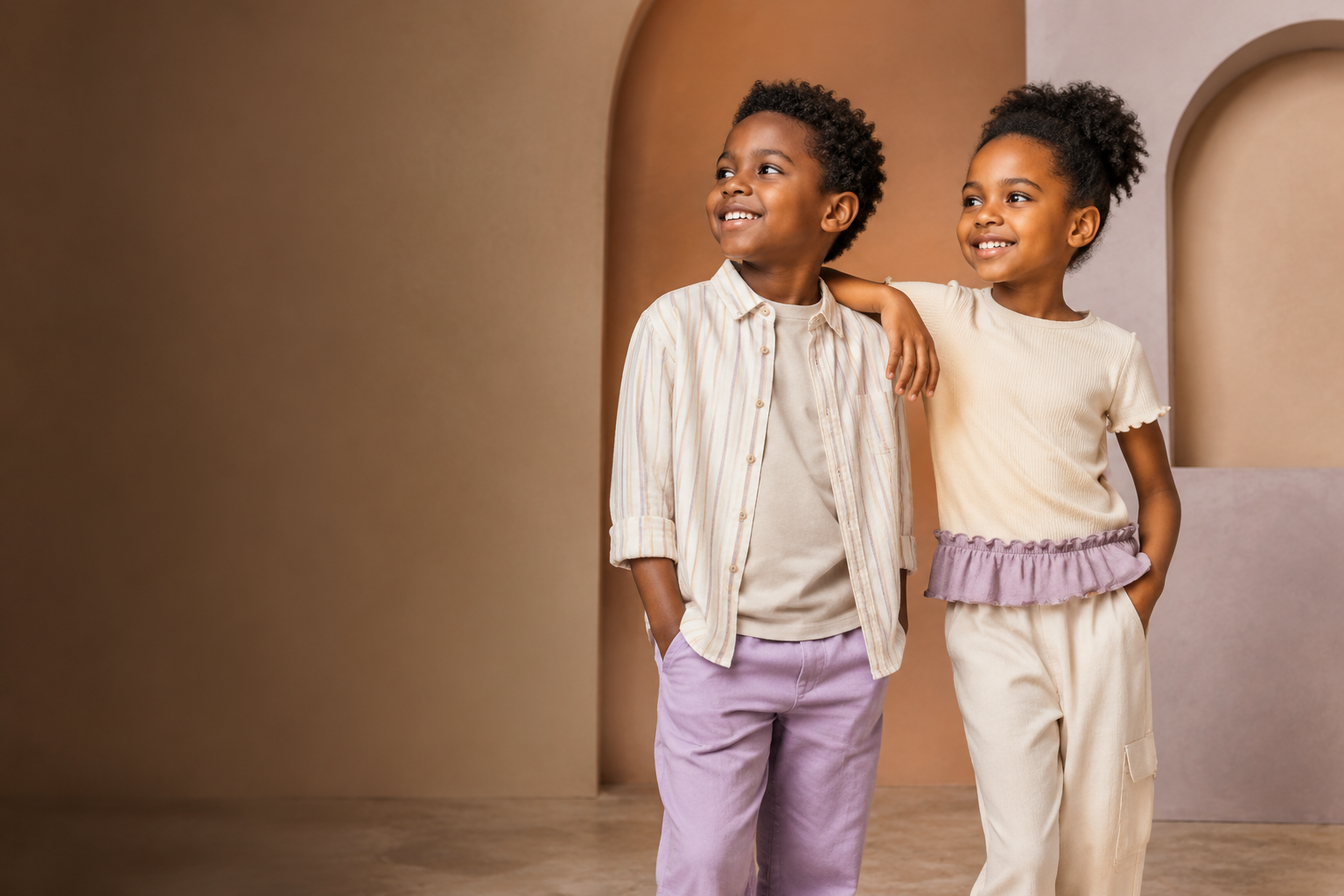 Two children wearing coordinated Mafi Kids outfits